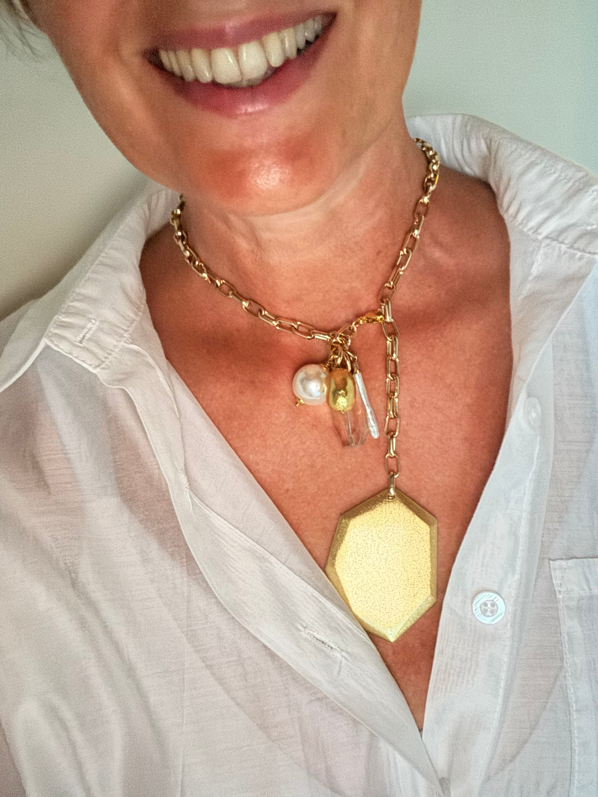 Catena con pietre e charms